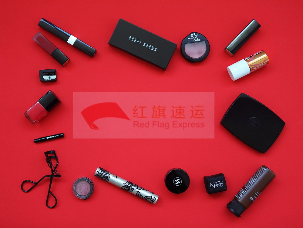 攝圖網_500567391_中國紅背景節日化妝品擺放（企業商用）_副本.jpg